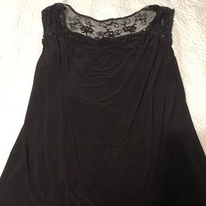 Cowl neck front shirt with lace/mesh shoulders.